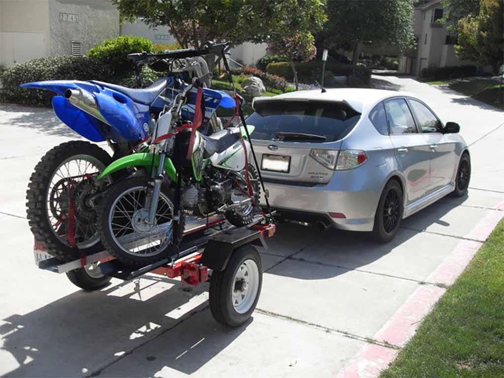 Can You Haul a Dirt Bike with a Car? Racks, Trailers, & More - Risk Racing