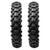 Two Plews off-road dirt bike tires with knobby tread pattern on a white background